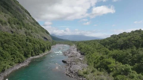 River Rapids Through Forest and Volcanic Rocks in Chile Petrohue Waterfalls Stock Footage 310613319