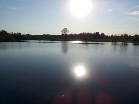 River reflection sun Foto stock