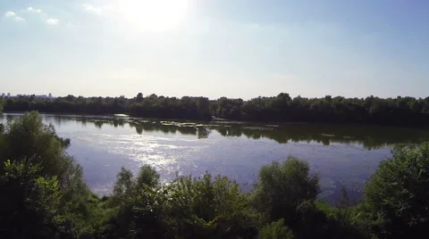 River with reflection of the sun in water. Aerial. Stock Footage 40616510