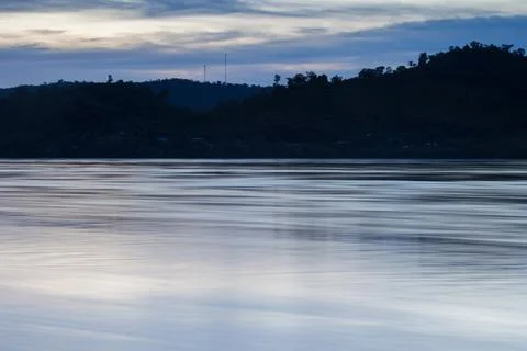 River reflection with tree  at night time Stock Photos