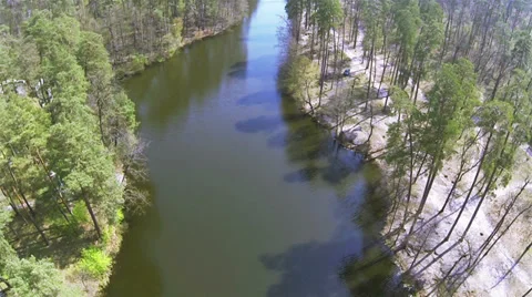 River with reflections of trees. Aerial Stock Footage 37626848