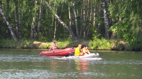 River resque and tourists float on the motor inflatable boats at nature reserve Stock Footage 52363740