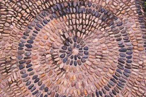 River Rock pebbles background on floor Stock Photos