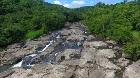 The river rocks of Ai Beling Waterfall in Sumbawa, Indonesia Stock Footage 131422812