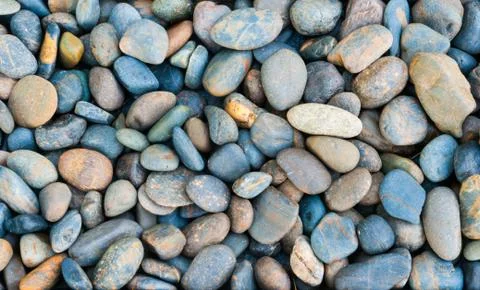 River rocks background Stock Photos
