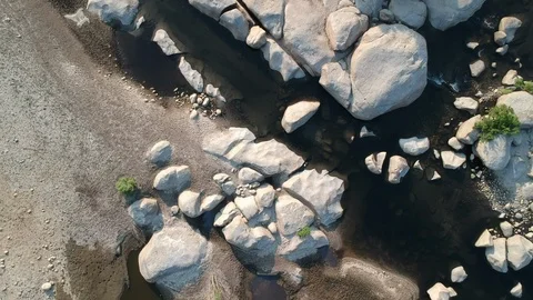 River with rocks - drone shot zoom out Video stock 107880342
