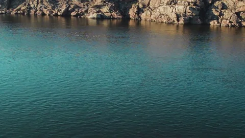 River with a Rocky Shore Stock Footage 73664089