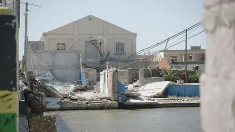 River running in front of rubble Stock Footage 340820874