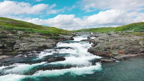 River running through the mountains, part 1 of 2 Stock Footage 253406468