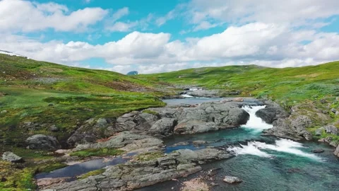 River running through the mountains, part 2 of 2 Stock Footage 253409554