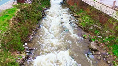 A river running through a small town Stock-Footage 272801098