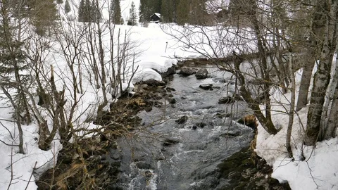 A river running through a winter landscape Vídeo Stock 95407480