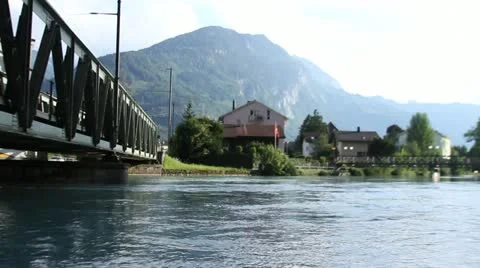 River Running Under Bridge Under Swiss Alps Stock Footage 21376780