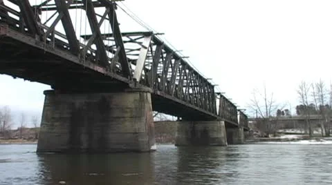 River running under old bridge in winter Stock Footage 10754418