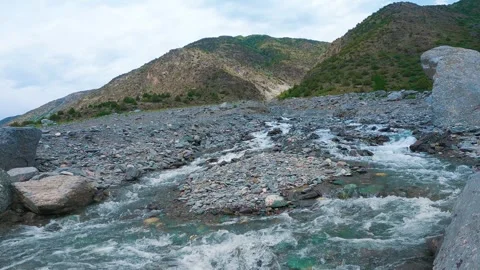 The river runs over the rocks Stock-Footage 245425242