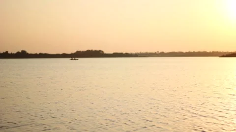 River Runs On Sunset Background Stock Footage 68293683