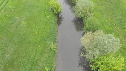 River runs through countryside 動画素材 266723247
