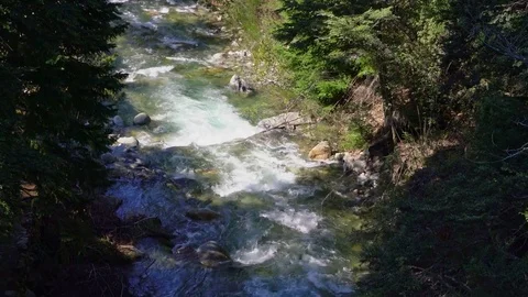 River rushing downstream Stock Footage 73213618