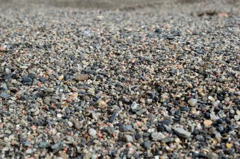 River sand and pebbles close up in summer Stock Photos