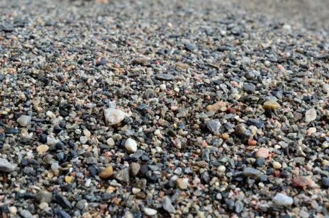 River sand and pebbles close up in summer Stock Photos