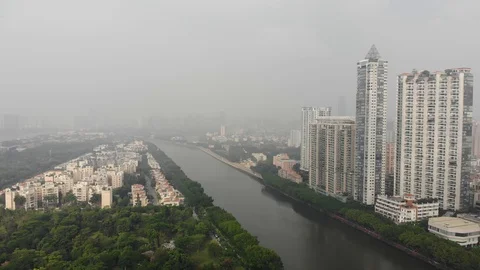 River shares the area with multi-storey residential buildings and luxury forks Stock Footage 118472200