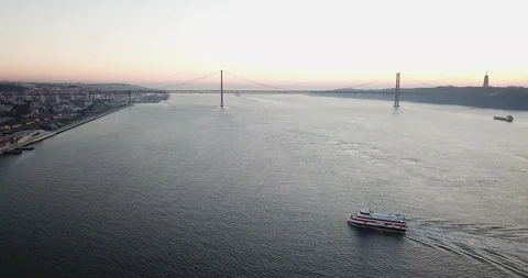 The river ship sails across the river at dawn against the blue cloudless sky Stock Footage 130116601