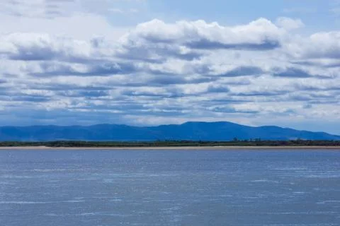 River, sky, summer. Stock Photos