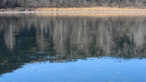 The river with a slow current on the background of the mountains in early spring Stock-Footage 106197208