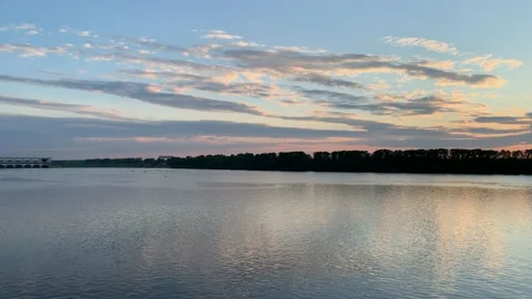 A river in a small town. Early evening Stock Footage 172099324