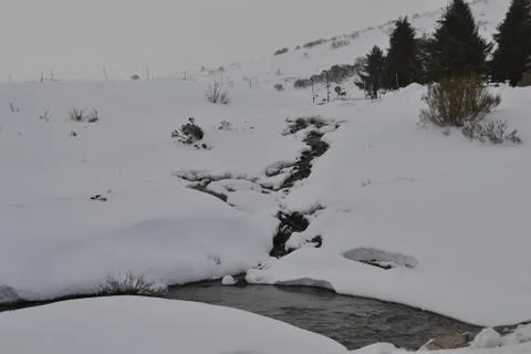 River on the snow Stock Photos
