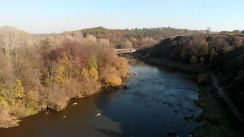 River Southern Bug with rapids, old watermill and bridge in Sokilets, Ukraine Stock Footage 161505958