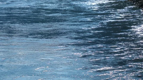 The river sparkles and flows freely reflecting sun glare 스톡 동영상 114609075