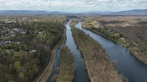 River split in american rural landscape during sunny day with clouds. Virginia Stock Footage 307639689