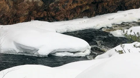 River in spring with snow. Stock Footage 123790970