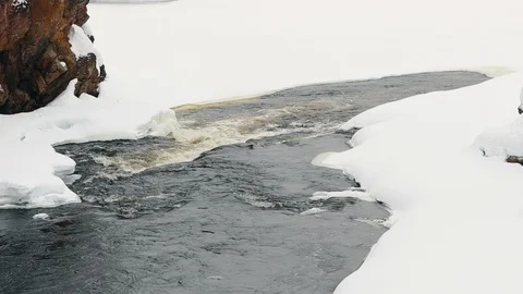 River in spring with snow. Stock Footage 123792940