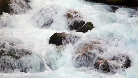 A river with stones in it Stock Footage 331358690