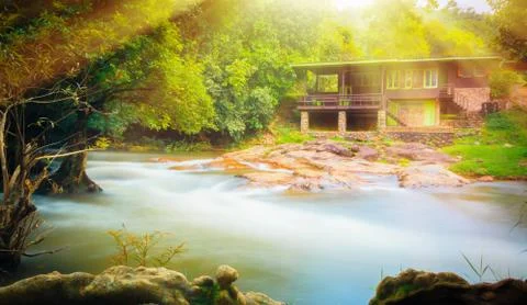 River stream and houses Stock Photos