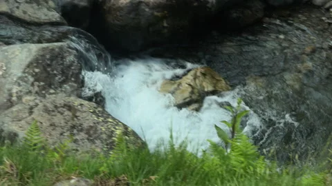 River Stream and Short Waterfall Flowing Through Scafell Pike Stock Footage 303915942