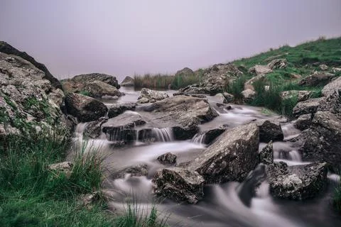 River Stream Flow Zen Grass Rocks Fog Scotland Nature Stock Photos