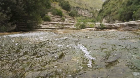 River stream flows in slow motion in Nature Reserve Cavagrande, Sicily Stock Footage 114500725