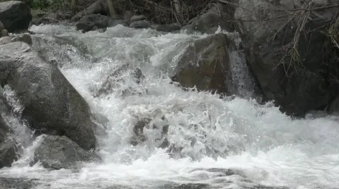 River Stream footage, river flowing between rocks in nature Stock Footage 313817422
