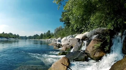 River Stream footage, river flowing between rocks in nature Stock Footage 313817453