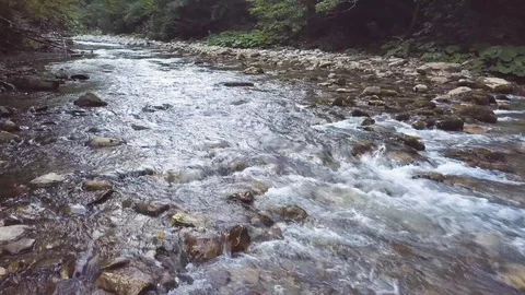 River stream quickly flowing on stones drone shooting from above Stock Footage 94562892