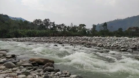 River with strong current and shore in Peru 스톡 동영상 283197833