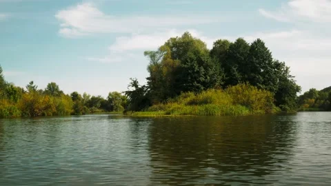 River in summer. reflection of trees in the water. panorama from the water. summ Video stock 158857331