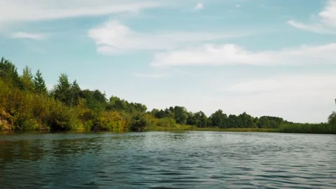 River in summer. reflection of trees in the water. panorama from the water. summ Video stock 158857794