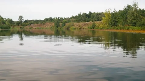 River in summer. reflection of trees in the water. panorama from the water. summ Video stock 158860512