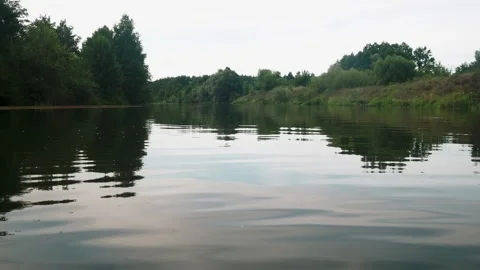 River in summer. reflection of trees in the water. panorama from the water. summ Video stock 158860907