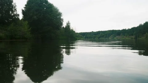 River in summer. reflection of trees in the water. panorama from the water. summ Video stock 158861138