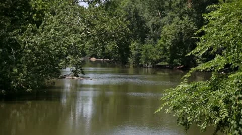 RIVER IN SUMMERTIME, QUIET MIDWEST SCENE Stock Footage 21960587